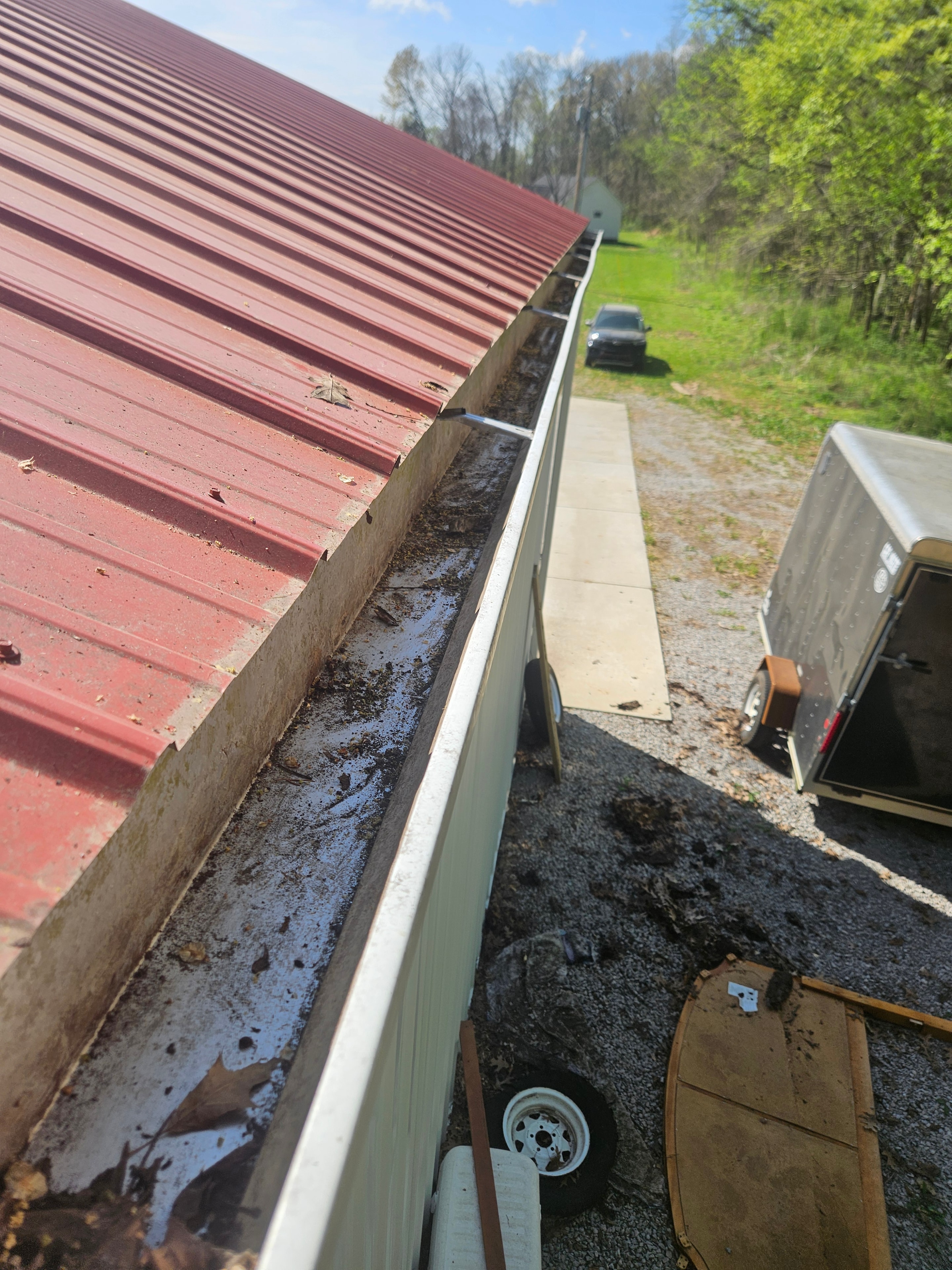 After: Gutter before and after cleaning and brightening